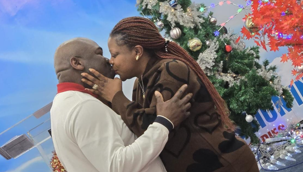 A married couple sharing a moment of love at the altar